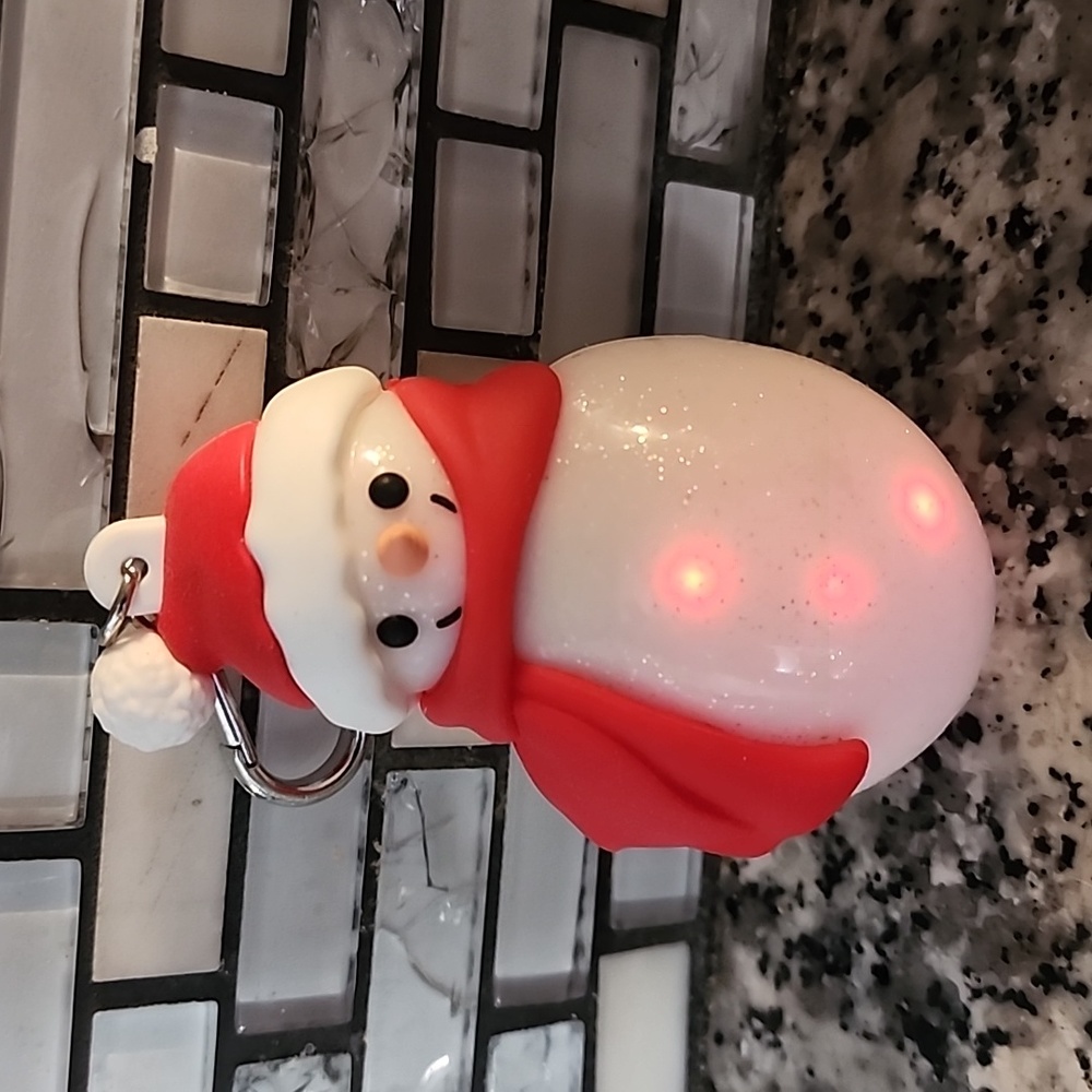 BBW rare Christmas snowman lights up red and green on his tummy.